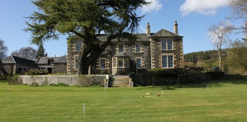 Country House, a Georgian manor on a private estate near Auchtermuchty, seen across its croquet lawn